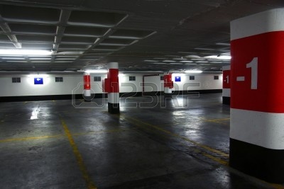 5377709-empty-underground-parking-lot-with-big-concrete-columns.jpg