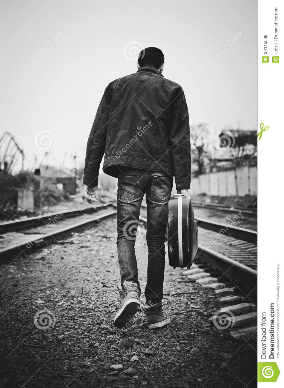 young-man-guitar-case-hand-going-away-re